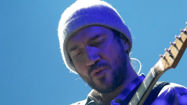 John Frusciante playing guitar knit cap
