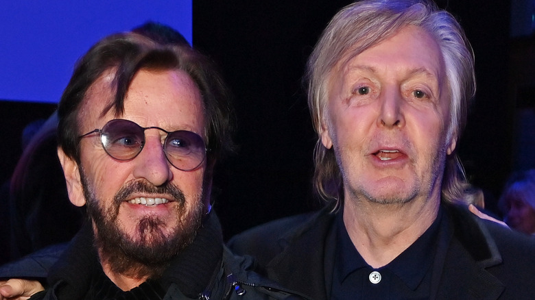 Paul McCartney Ringo Star smiling