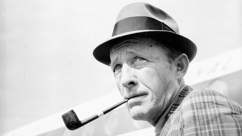 Bing Crosby photographed at an airport