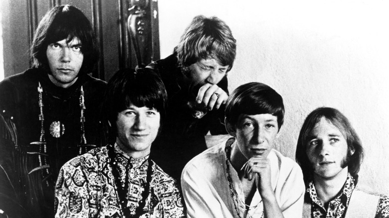 Buffalo SPringfield posing for a portrait in a black and white photo