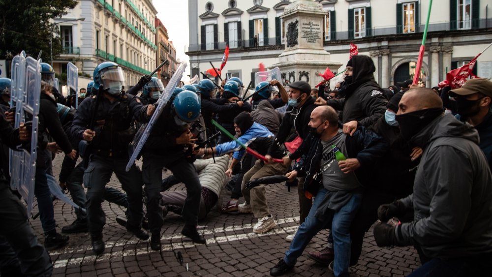 police clash with protestors in Naples, Italy October 2020