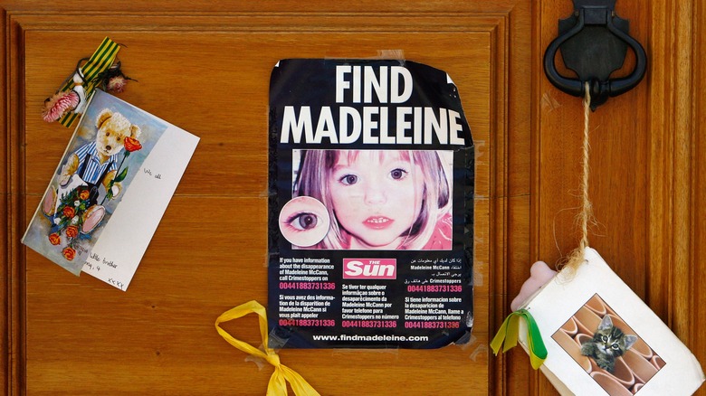 Find Madeleine poster on wooden cupboard