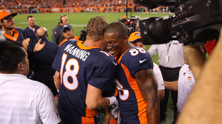 Demaryius Thomas hugging Peyton Manning