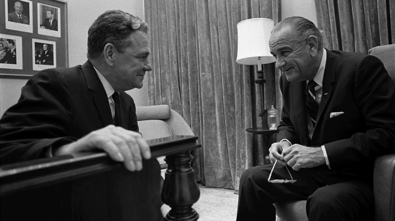 Thomas Boggs sitting with President Lyndon Johnson