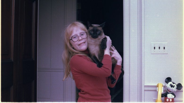 Amy Carter holding cat