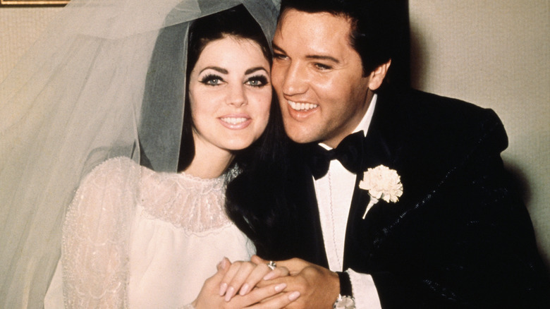 Priscilla and Elvis Presley at their wedding
