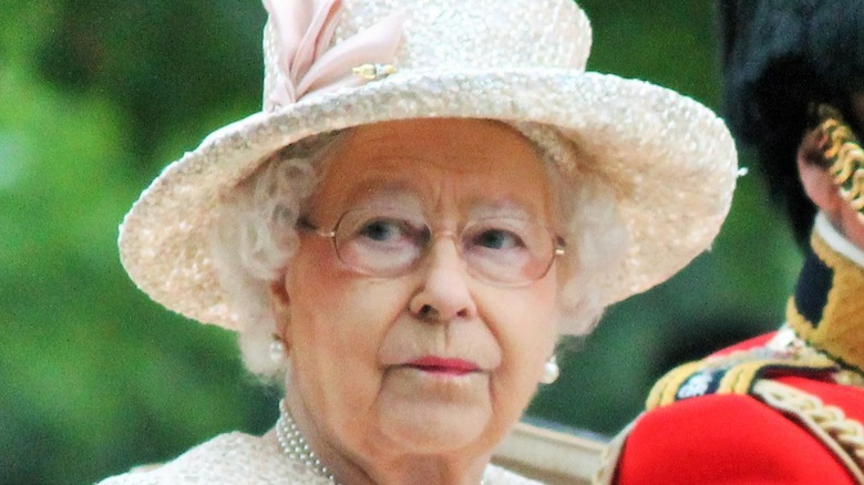 Queen Elizabeth wearing white hat