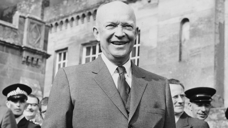 Dwight Eisenhower standing and smiling