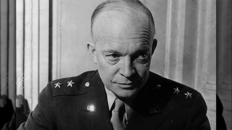 Eisenhower signing document