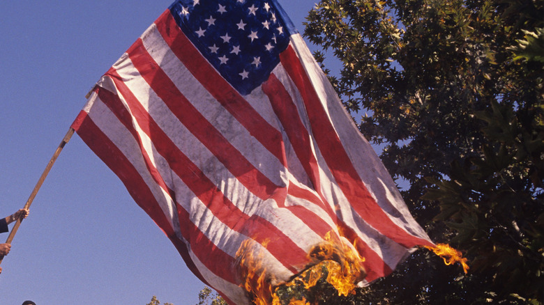 An American flag burning