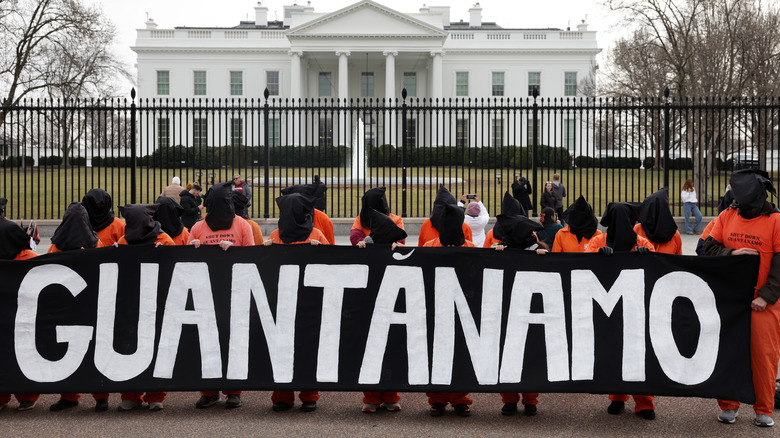 guantamo bay protesters in front of white house orange clothes bags on heads