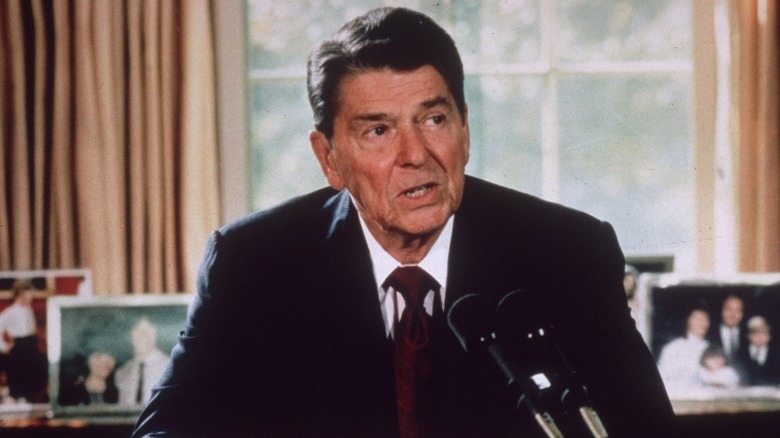 Reagan reading speech in Oval Office