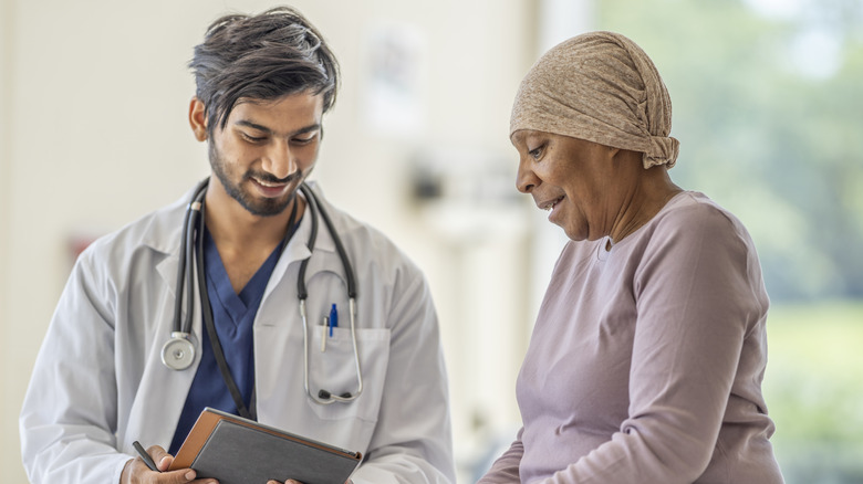 doctor consulting with cancer patient