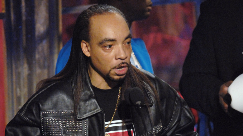 Kidd Creole in a black leather jacket