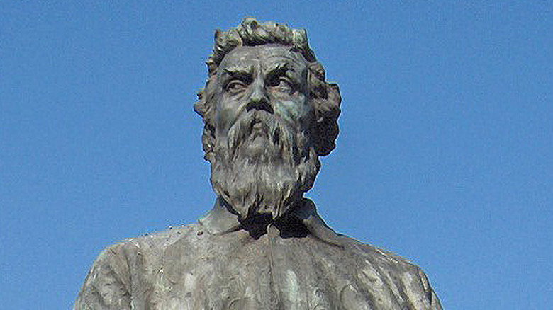 green stone statue of Benvenuto Cellini bust