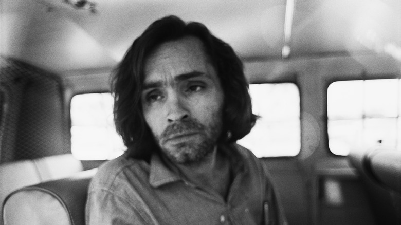 Charles Manson mournful in car