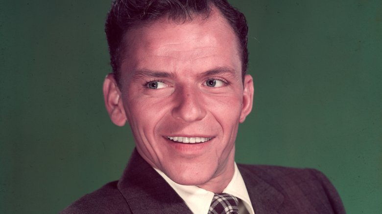 Frank Sinatra looking right smiling