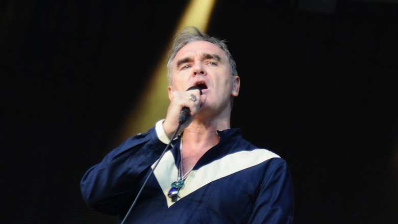 Morrissey singing mic blue white shirt