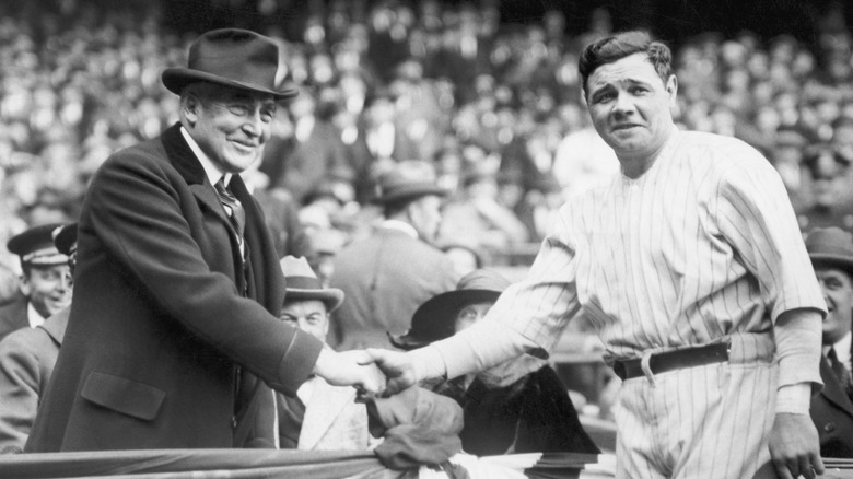 Warren G. Harding shaking hands with Babe Ruth