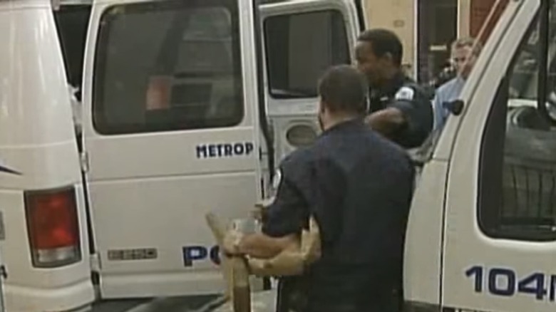Police loading evidence into van