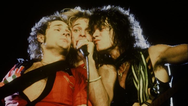 Michael Anthony, David Lee Roth, and Eddie Van Halen singing
