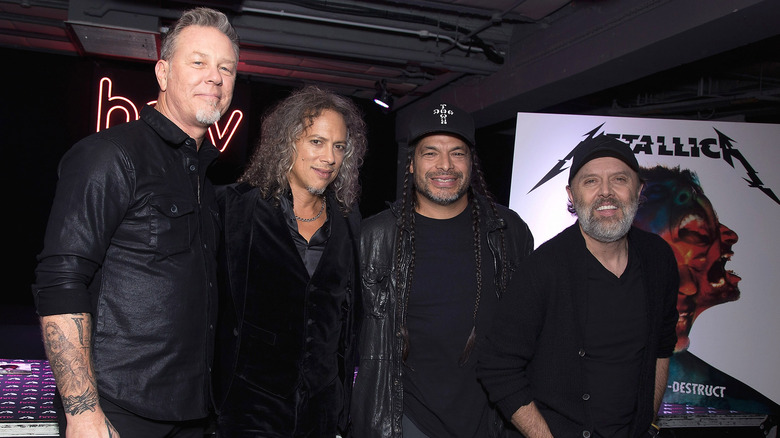 Metallica posing together for photo