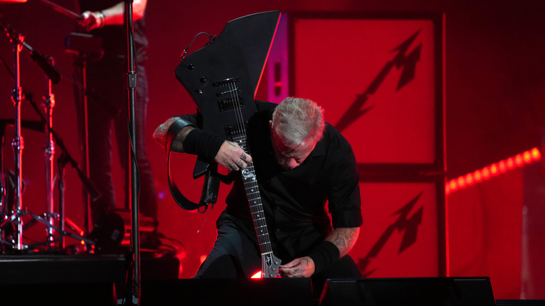 James Hetfield tuning his guitar