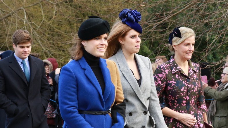 Princesses Beatrice and Eugenie outside Christmas event