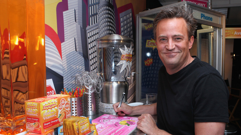 Matthew Perry smiling at promotional event