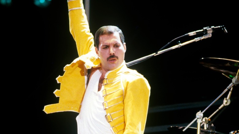 Freddie Mercury on stage with Queen