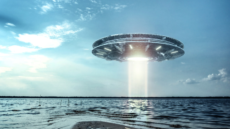 UFO hovering over water