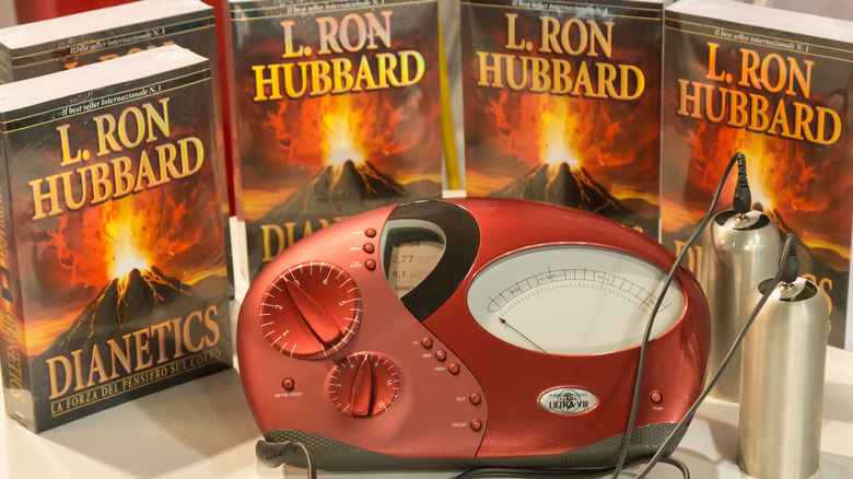 Dianetics books and E-meter on display