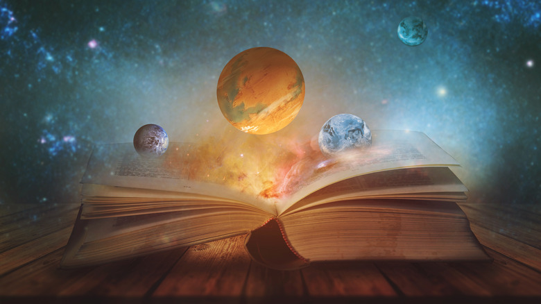 Planets above an open book