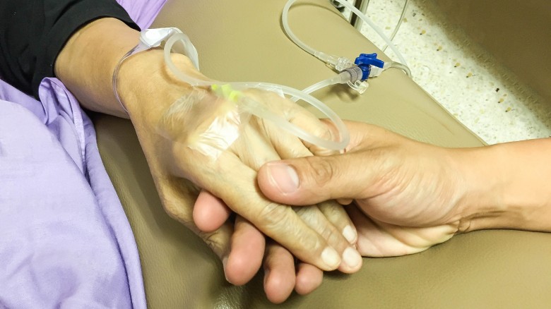 holding hand medical patient