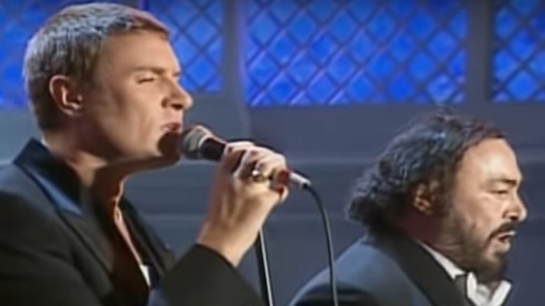 Simon Le Bon singing with Luciano Pavarotti in 1996