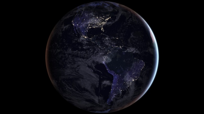 Planet Earth at night, showing city lights