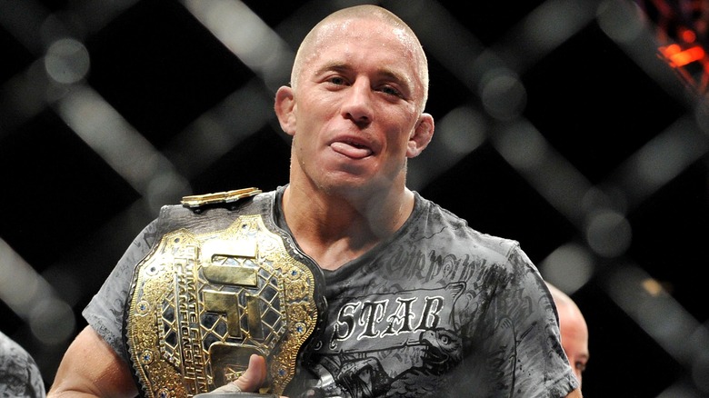 Georges St-Pierre holds UFC title