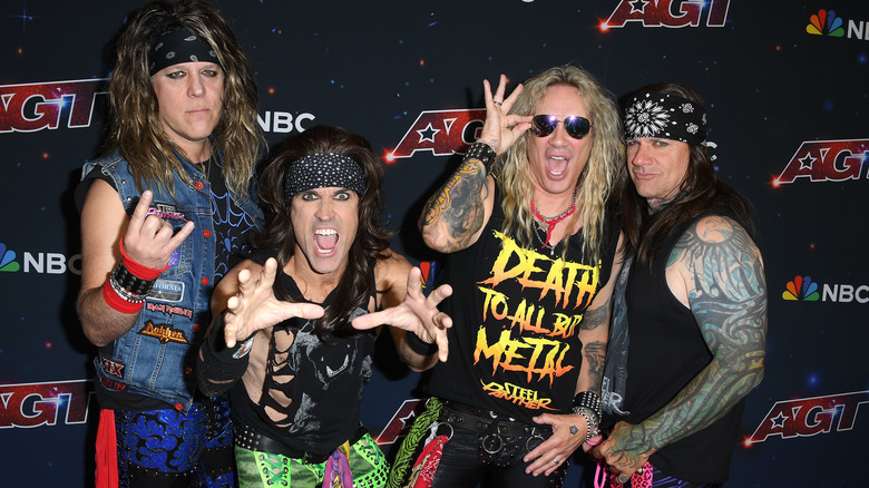 Steel Panther posing for photo