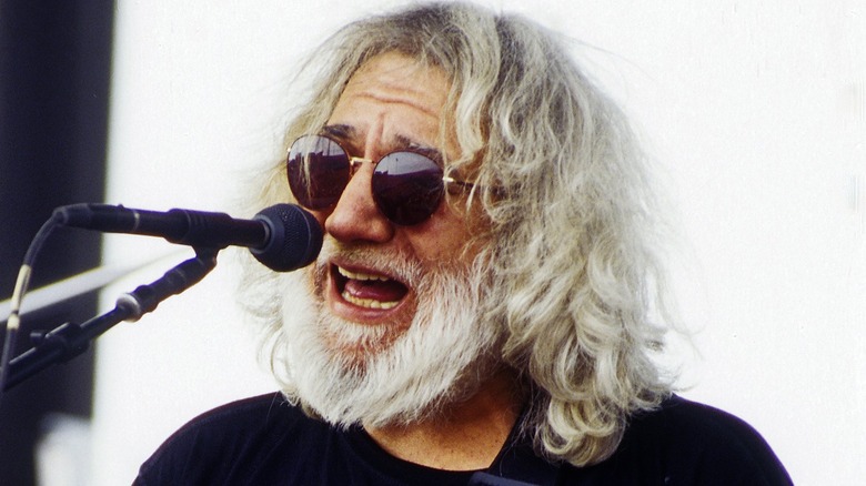 jerry garcia singing onstage sunglasses