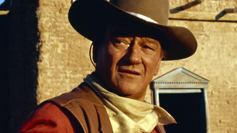 John Wayne looks over his shoulder