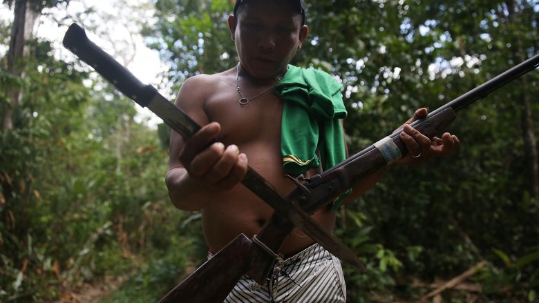 indigenous man in jungle