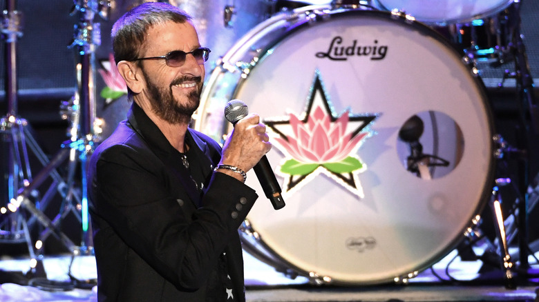 Ringo Starr onstage in front of drums