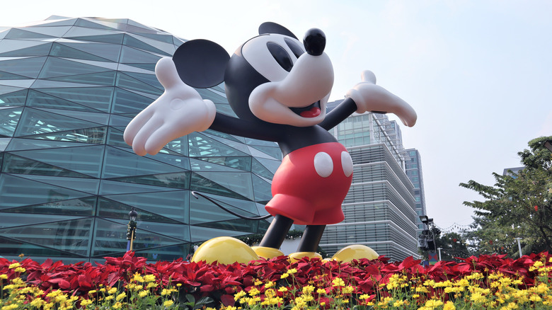 Mickey Mouse statue glass building