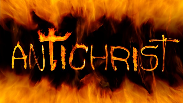 Word Antichrist written with fire