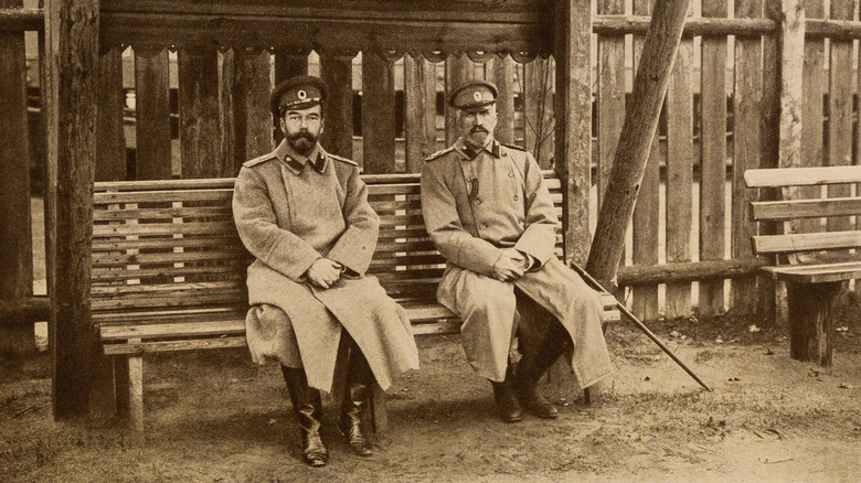 Grand Duke Nicholas Nikolaevich seated outside with Tsar Nicholas II