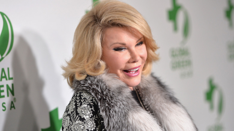 Joan RIvers smiling at a red carpet event