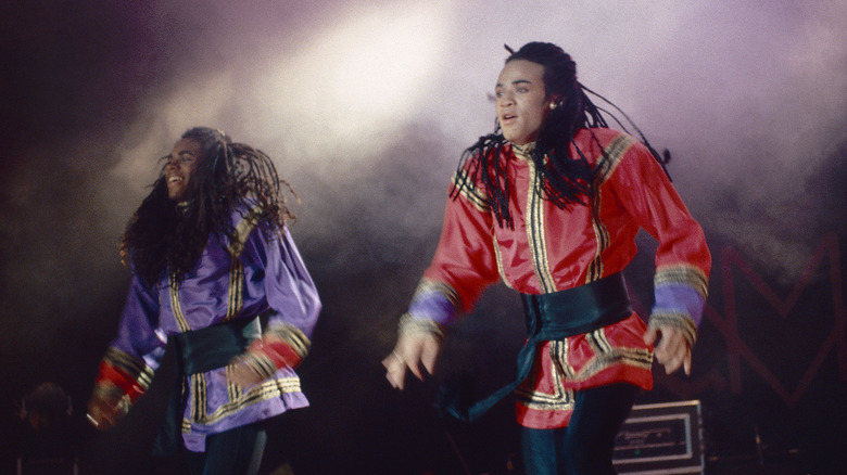 Milli Vanilli dance onstage in 1990