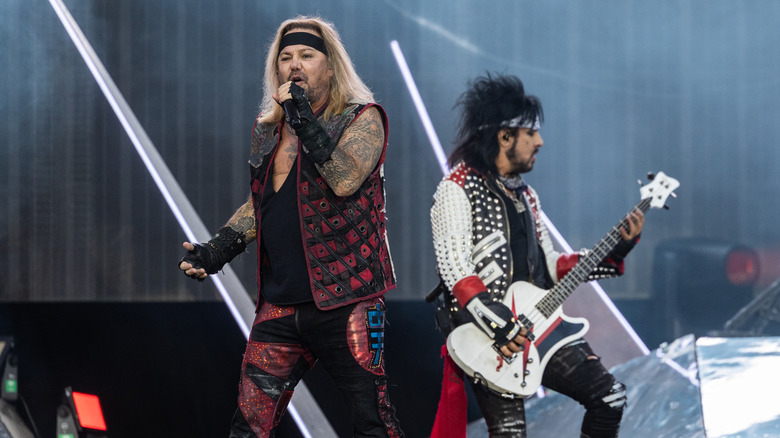 Vince Neil and Nikki Sixx on stage