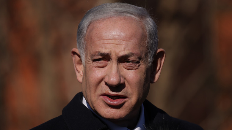 Benjamin Netanyahu in coat