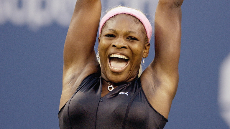 Serena raises arms in victory